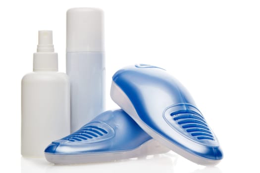 Electric shoes dryer with UV sterilization on a white background, Deodorant for shoe and antifungal agent. Shoe care products. Concept of healthy feet