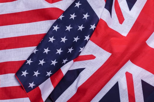 Two flags English union jack and USA star spangled banner. Material symbols of first world countries