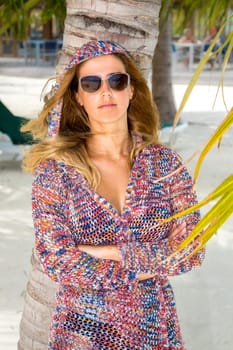 Blonde woman on the tropical beach