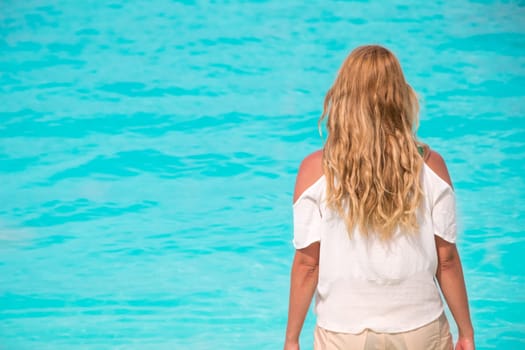 Pretty young woman at the sea