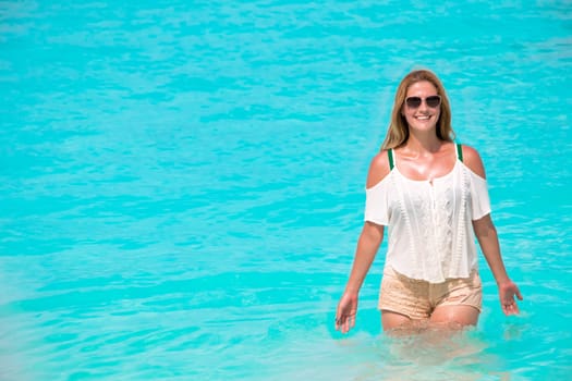 Pretty young woman at the sea