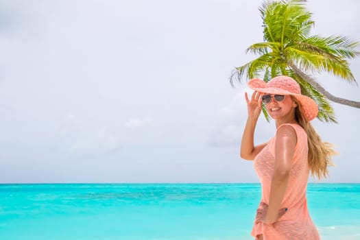 Beautiful girl on the coast of Maldives