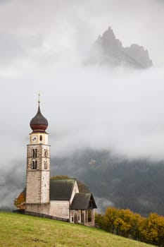 san Valentino church on a foggy late autumn day, Siusi allo Sciliar, Castelrotto, Dolomites, Italy