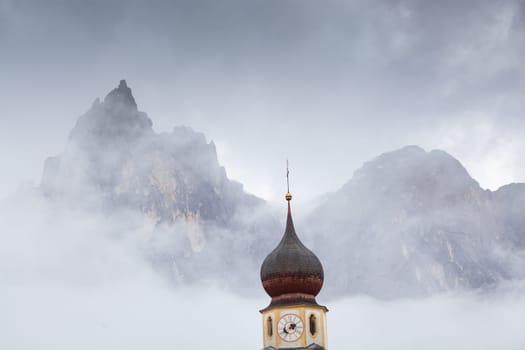 san Valentino church on a foggy late autumn day, Siusi allo Sciliar, Castelrotto, Dolomites, Italy