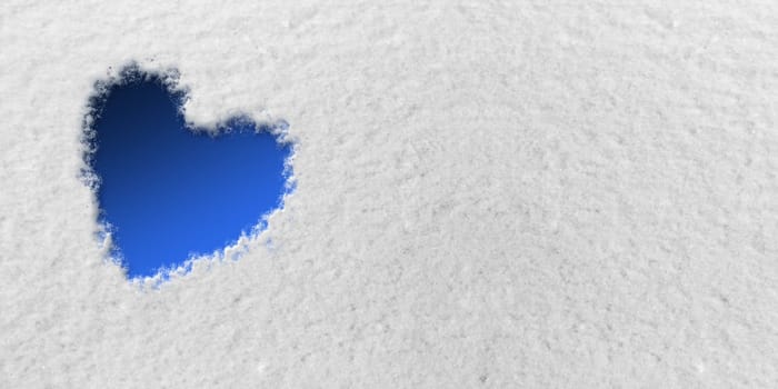 Blue Heart in front of Snow Background