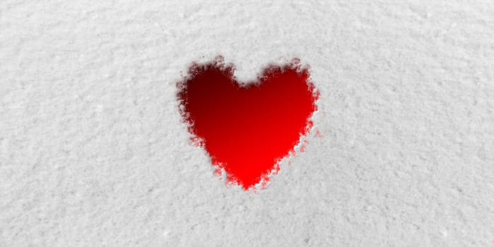 Red Heart in front of Snow Background