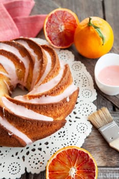Yummy bundt cake with blood oranges and pink frosting