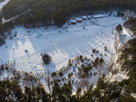 Aerial view of winter ski base in siberian forest