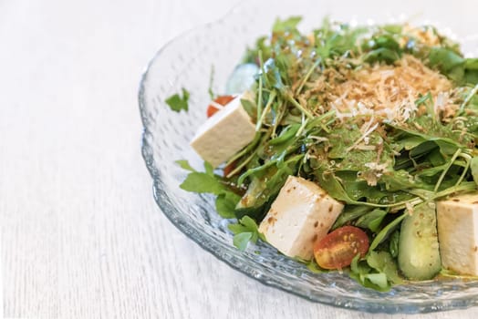 Tofu Salad with Arugula and onsen egg