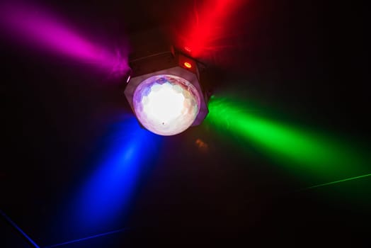 Colorful disco ball in night club, party concept