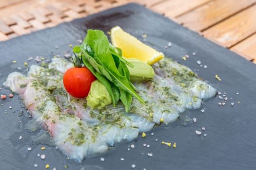 Sea bass sashimi mediterranean style cuisine