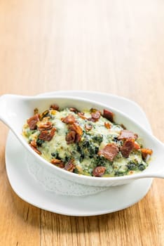 Baked spinach with cheese and becon