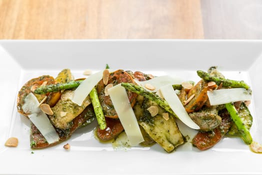 Grilled vegetables with Pestro Sauce omwooden table