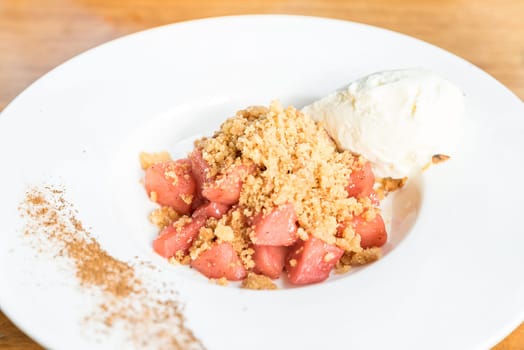 apple crumble with Icecream and cinnamon powder