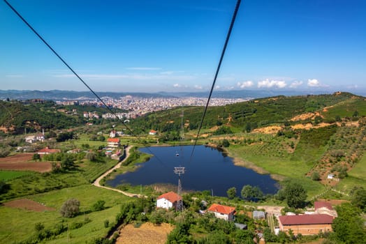 Rural landscape with Tirana, Albania in the background