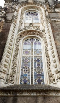 Window in the Neo-Manueline architectural style of the Palace Hotel of Bussaco, built in late 19th century, in Bussaco, Portugal