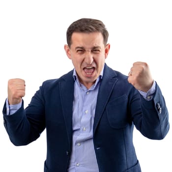 Businessman enjoying himself and shouting after a winning and successful business fight