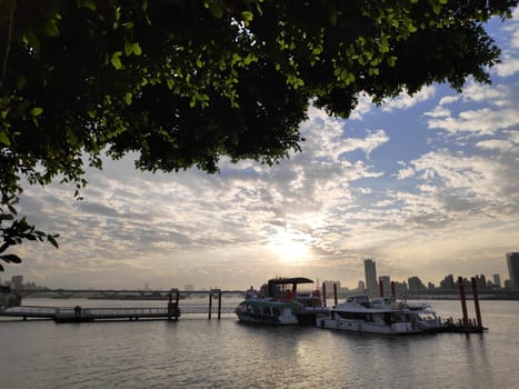 Taipei Dadaocheng Ferry Terminal, Taiwan - June 14, 2019 : The beautiful Dadao Wharf is located along the Danshui River. At sunset, it attracts many tourists to enjoy the sunset.