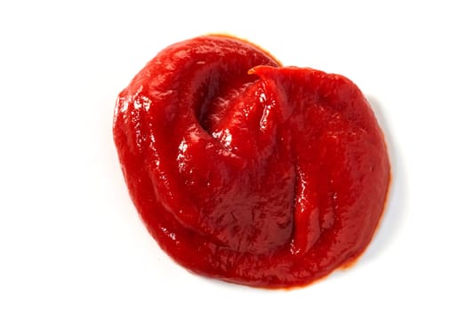 Dollop of spicy freshly made tomato sauce, ketchup or catsup isolated on white viewed from overhead