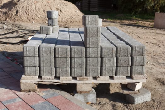 Brick tiles stacked on a pallet in construction site