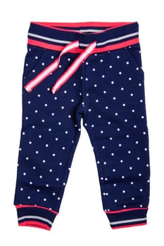 Kids pants isolated. A stylish fashionable dark blue denim trousers with white dots for the little girl. Children sport trousers.