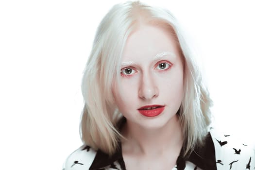 portrait of blonde albino girl in studio.