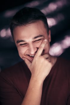portrait of a young man on a blurred background.