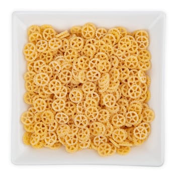 Raw Noodles in a bowl isolated on white background
