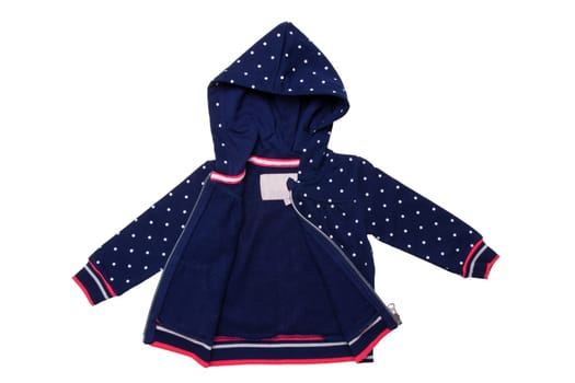 Kids jacket isolated. A stylish fashionable dark blue jacket with white dots and blue lining for the little girl. A sport jacket with hood for jogging isolated on white. Children sport fashion.