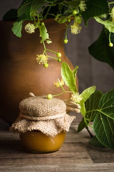 Jar with white honey on the table,close-up