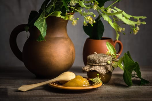 Jar with white honey on the table,.close-up