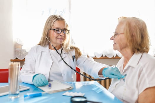Senior woman during a medical exam with her practitioner