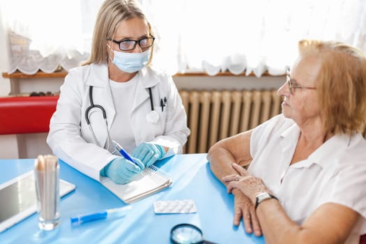 Senior woman during a medical exam with her practitioner