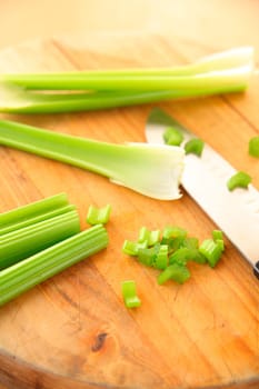 Cutting celery into small pieces with room for text