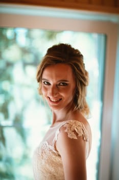 Beautiful young bride on blurred background.