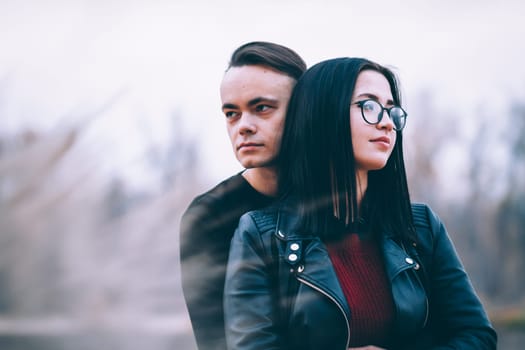 man and woman near the river autumn.