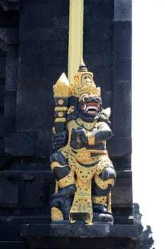Old hindu statue in outdoor at Tanah lot of Bali, Indonesia