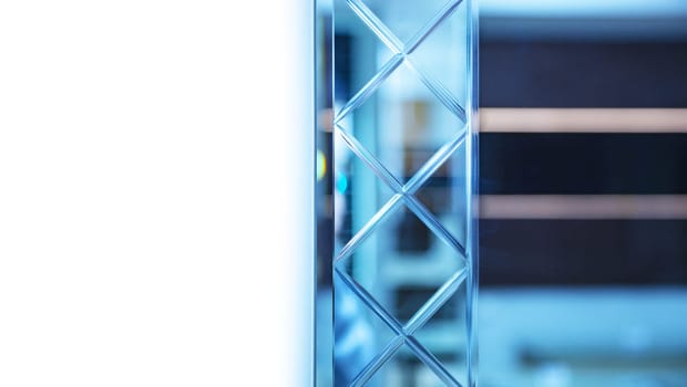 Glass, mirror reflection shapes and shadows. Close-up details.  Abstract geometric design with parallel and intersecting lines. Graphical representation of angle