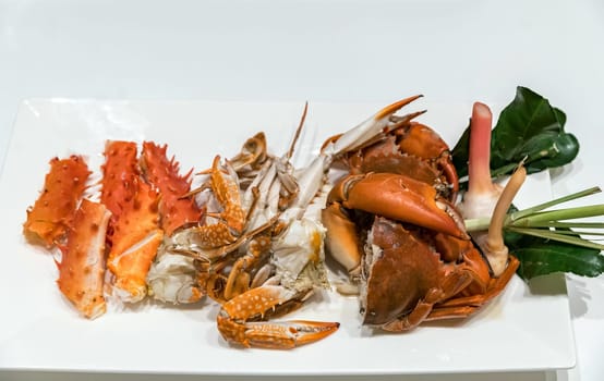 variety of Steam crab in white dish