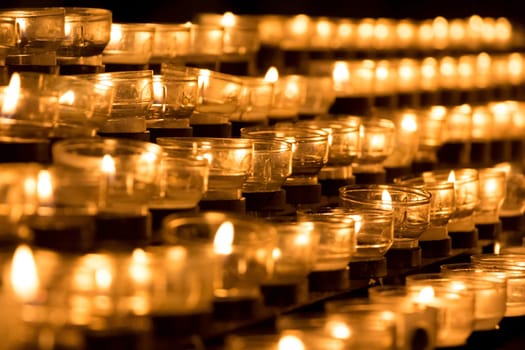 Candle is symbol of sacrifice for peace hope strength of life and soul. Also power towards sorrows and pain together in parish service
