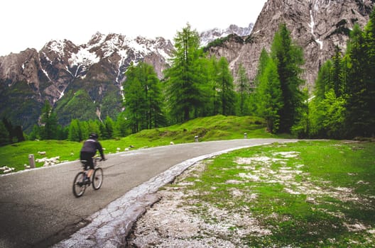 blurred cyclist mountain landscape background .