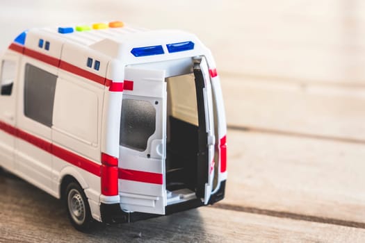 Bologna, Italy, 11 Jan 2018 - ILLUSTRATIVE EDITORIAL of ambulance doors background health care toy close up .