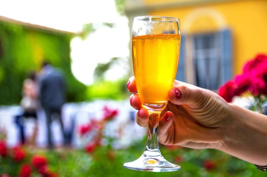 hand stem glass background woman drinking alcohol wine aperitif .