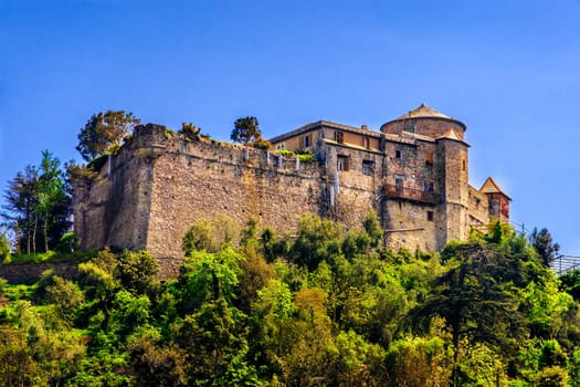 Castel Brown is an ancient castle on a hill in Portofino - Genoa - Liguria - Italy .
