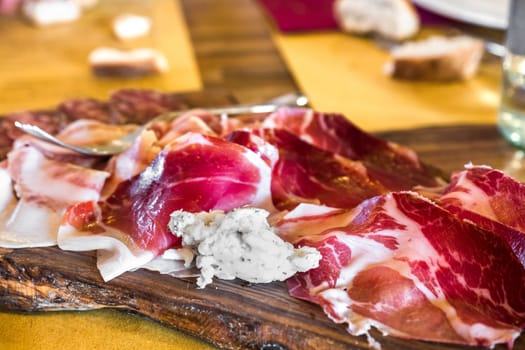 chopping board cold cuts from Parma - tagliere di affettati di Parma - Italy
