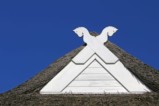 White horse heads on Low German hall house