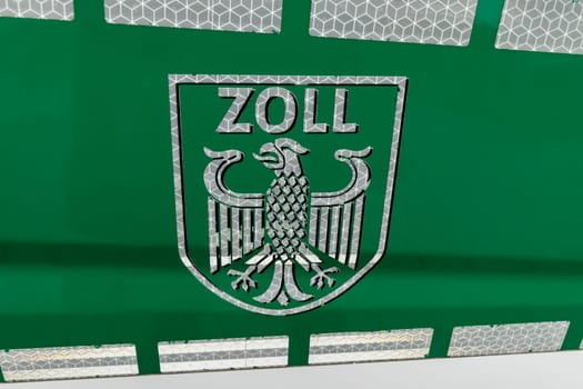 GIESSEN, Germany - JULY 19, 2018: ZOLL (Costums Duty Control) logo on a Car. Zollcontrolle ( Customs duty control ) - german police department for customs and duty control
