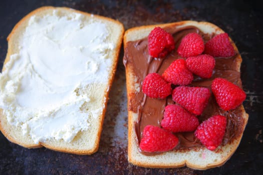 White bread with fresh fruit, cream cheese and chocolate spread