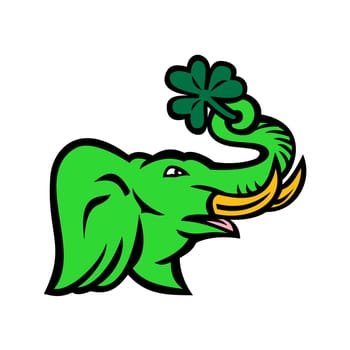 Icon retro style illustration of green elephant with big tusk holding a giant Irish shamrock using it's trunk viewed from side on isolated background.