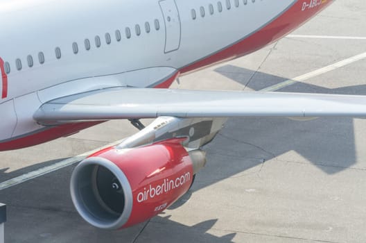 DUESSELDORF, NRW, GERMANY - MARCH 18, 2015: Up, Duesseldorf airport jet engine of an aircraft of Air Berlin. View of the tarmac...